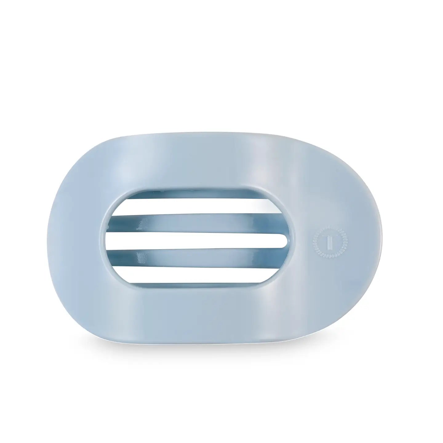 round flat hair clip in a very light sky blue