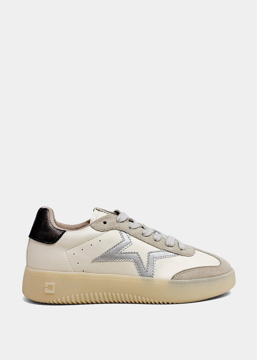 Cream and silver star sneaker with a platform sole, low-top silhouette, and brown laces.