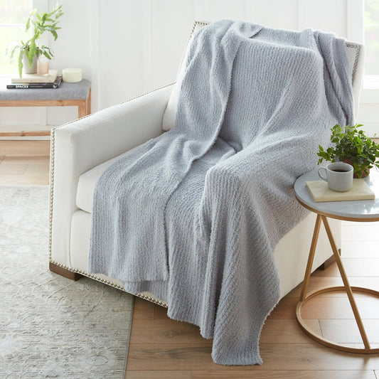 Grey Premier Ribbed Cozy Knit Throw.  This extremely cozy throw is made with plush, ultra-soft fabric and offers an outstanding hand-feel making it an irresistible must-have accent in your home. 
