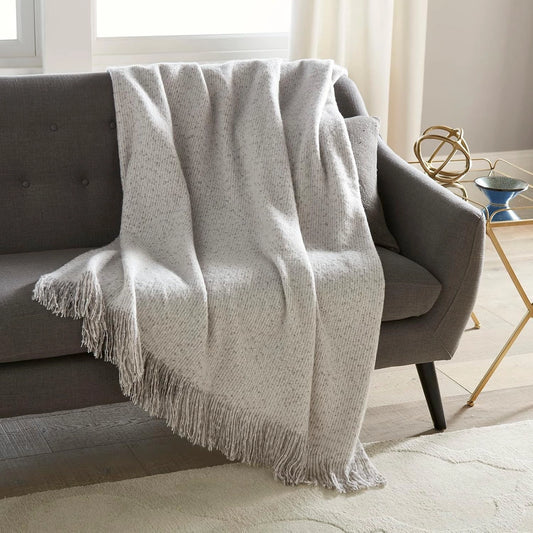 Grey Faux Mohair Throw is irresistibly soft giving you your favorite cozy feeling while adding a playful edge to your home environment! The fringed edges give it a unique twist and help texturize your décor.