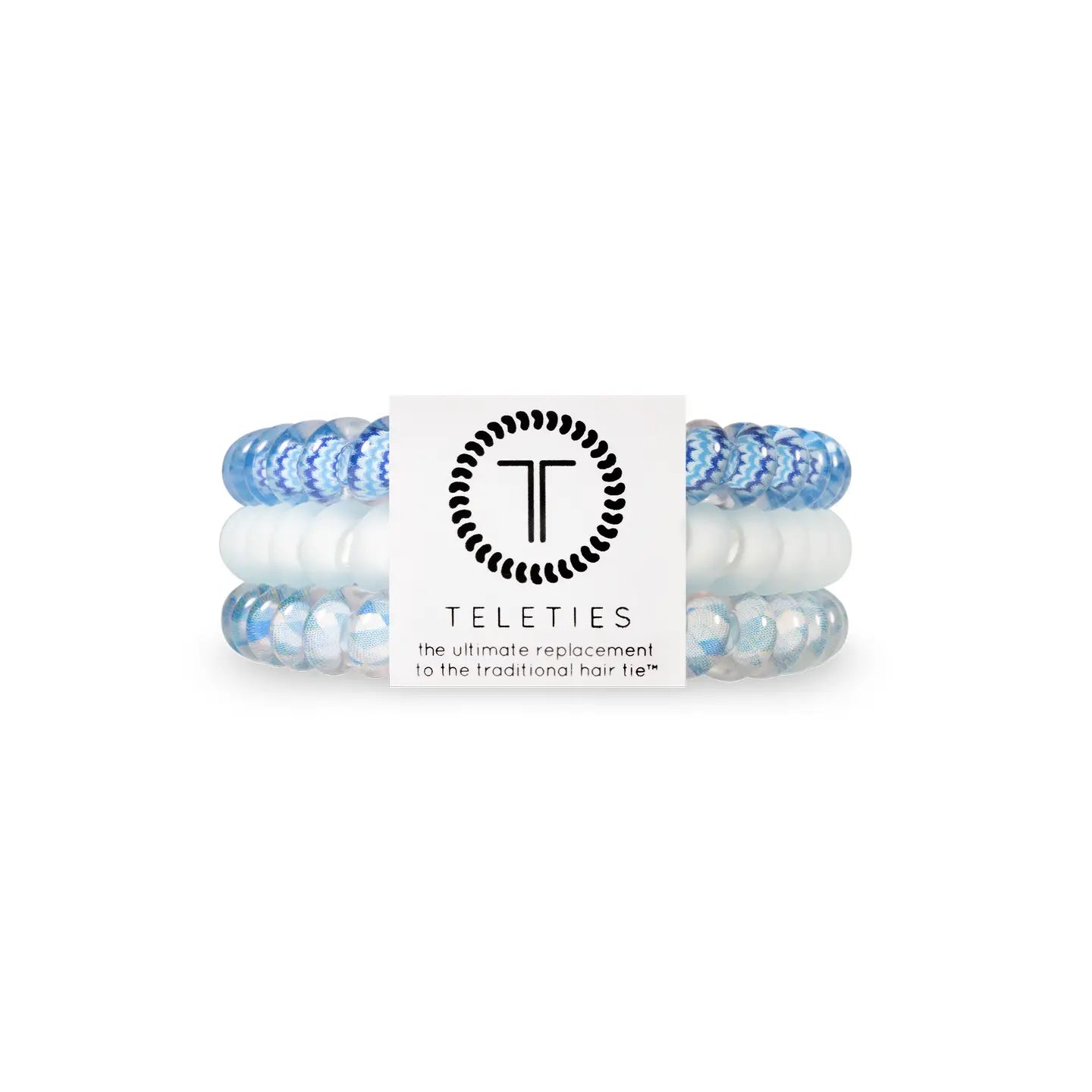 set of three hair coils: one chevoron blue mix one, one white matte, and one white with blue diamonds