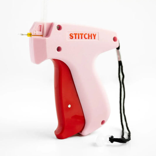 Pink and red sewing tool