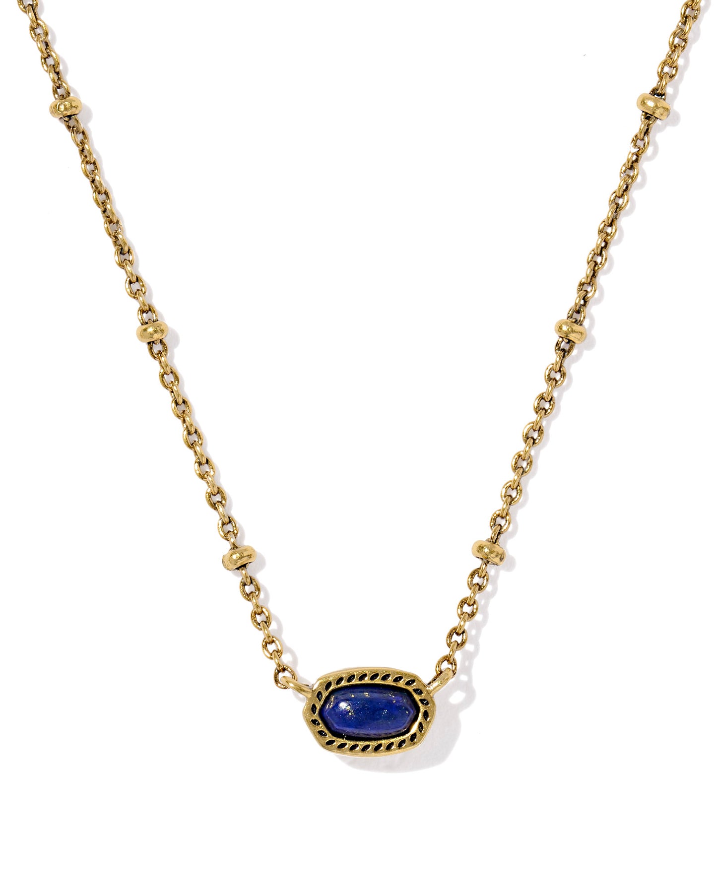 Gold necklace with a oval navy stone pendant, the chain has a small circular details and the pendant is set within a textured gold frame. 