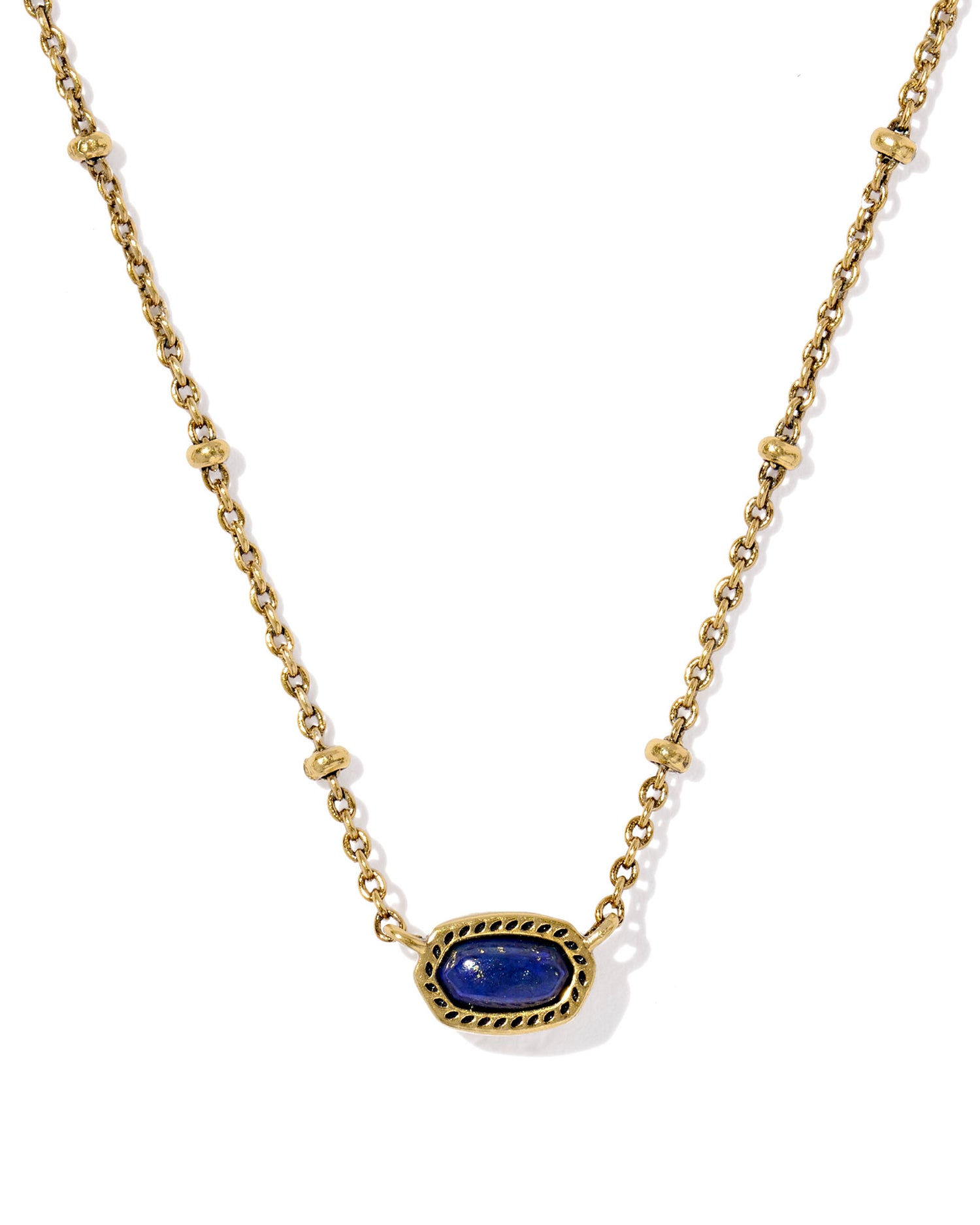 Gold necklace with a oval navy stone pendant, the chain has a small circular details and the pendant is set within a textured gold frame. 