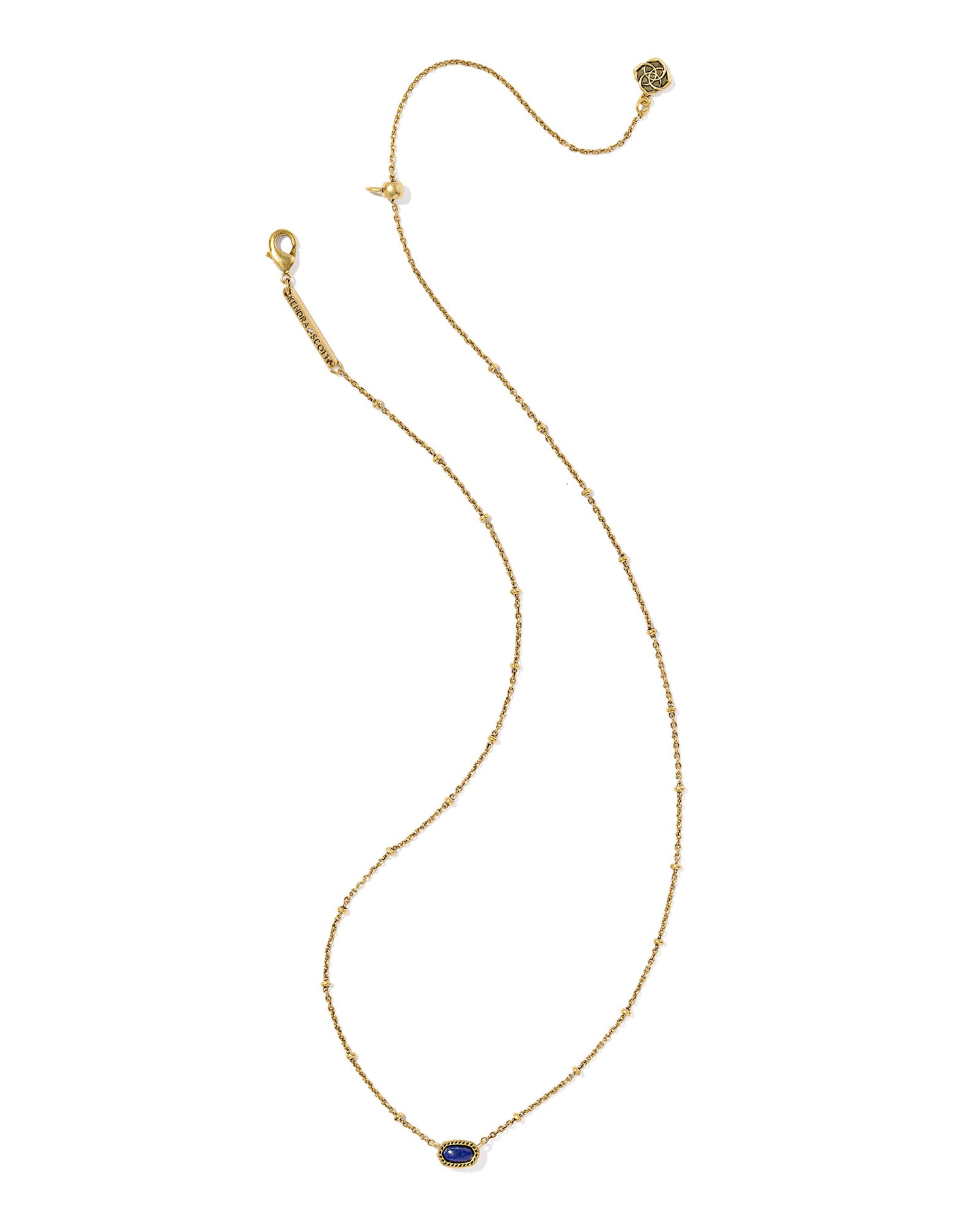 Gold necklace with a oval navy stone pendant, the chain has a small circular details and the pendant is set within a textured gold frame. 
