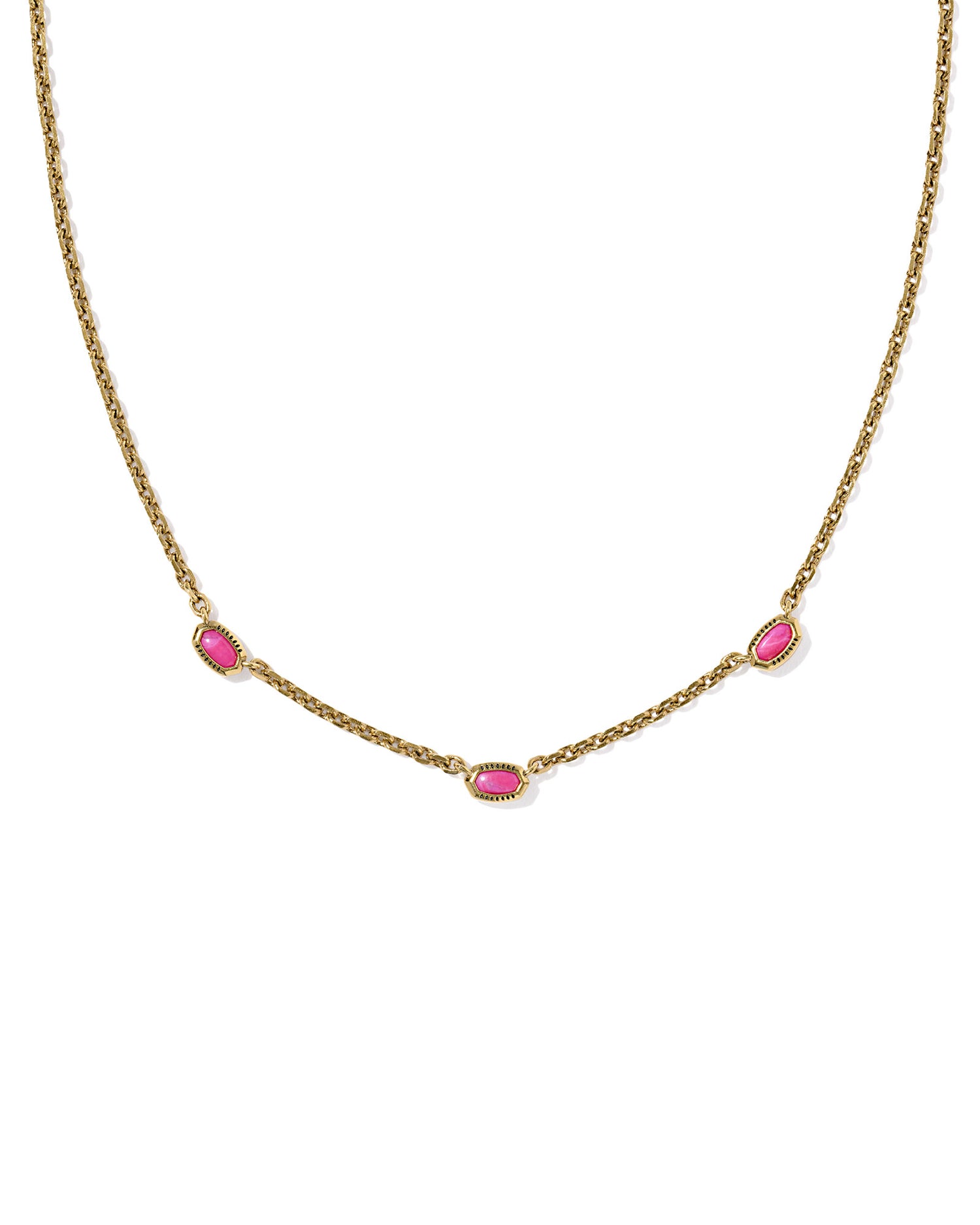 Gold necklace with three oval-shaped pink gemstones evenly spaced along the chain. 
