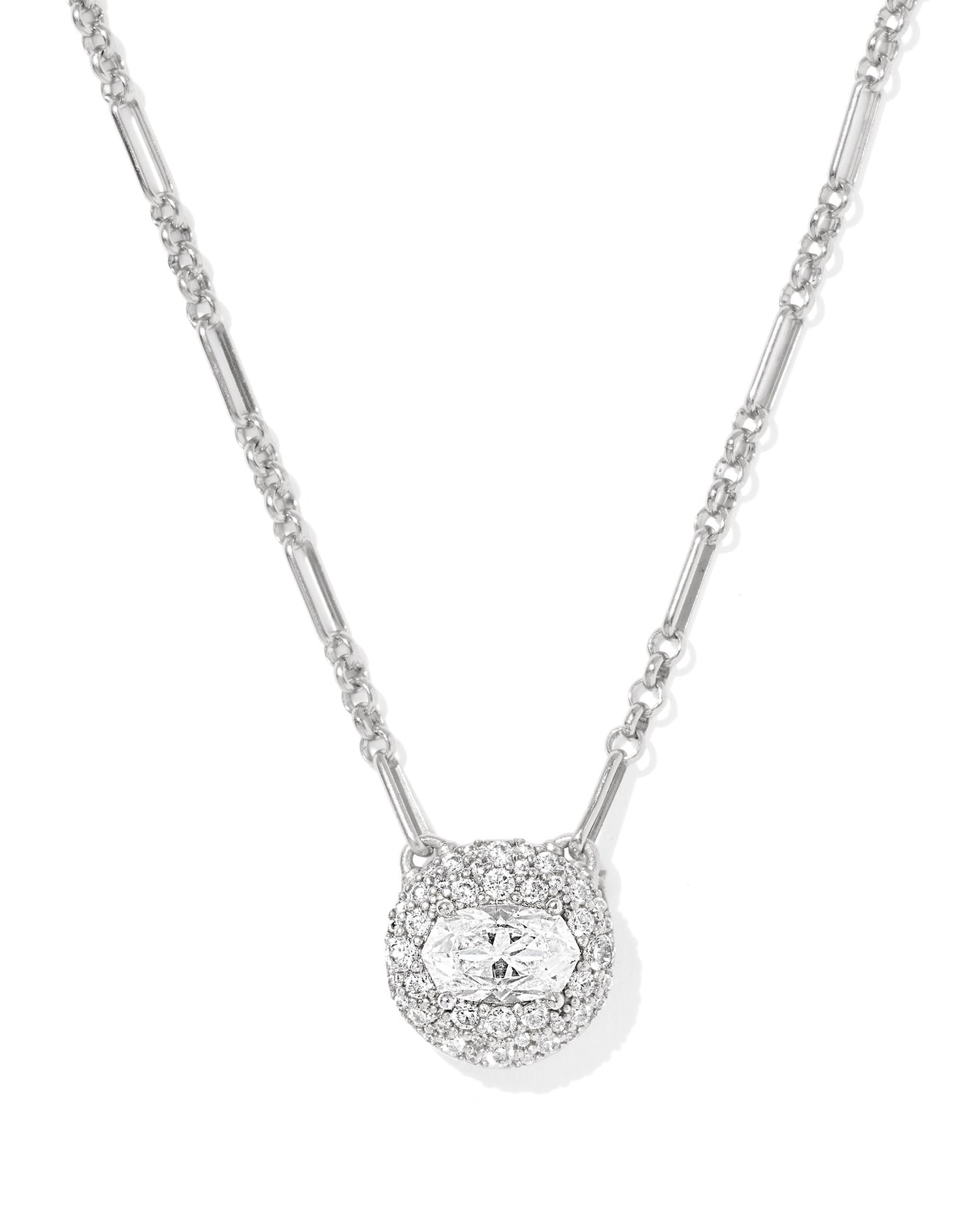 Silver necklace with round pendant dusted with cubic zirconia accents and a custom-cut crystal in the oval Elisa shape