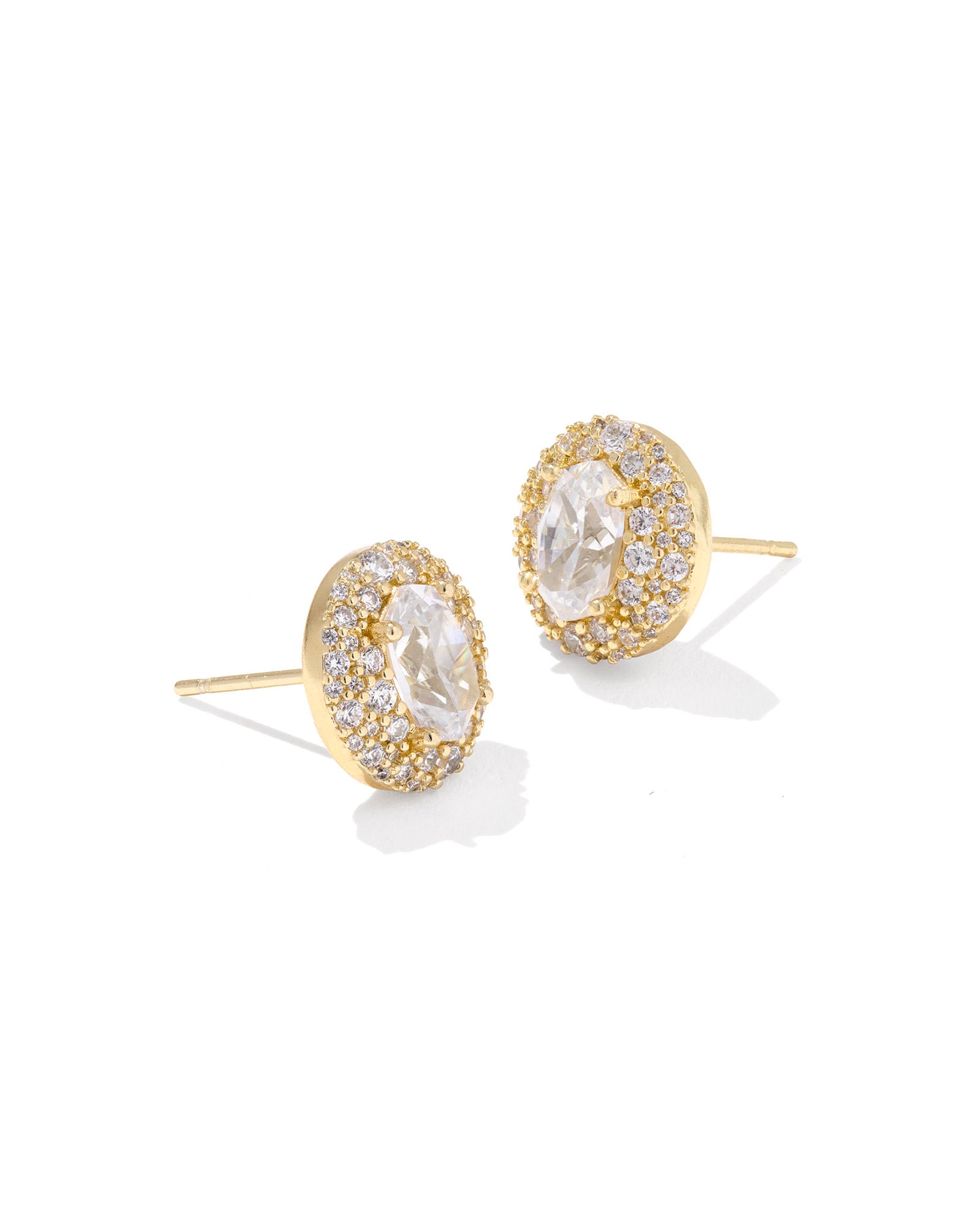 circular studs feature a custom-cut crystal at their center inspired by our bestselling Elisa shape, surrounded by dazzling cubic zirconia sparkle
