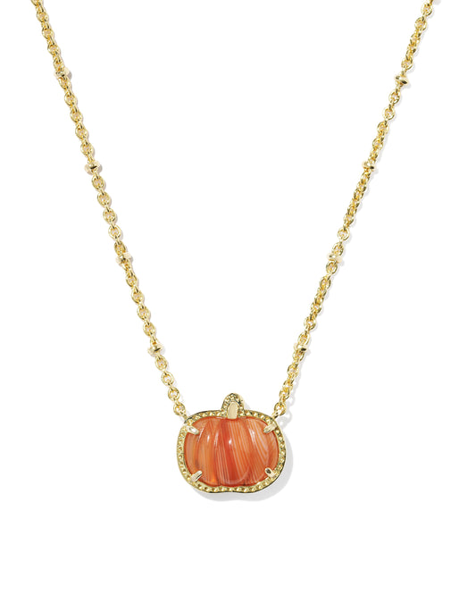 A gold chain necklace featuring a pumpkin-shaped pendant with a carved orange shell center and a textured border , shown on a plain white background 