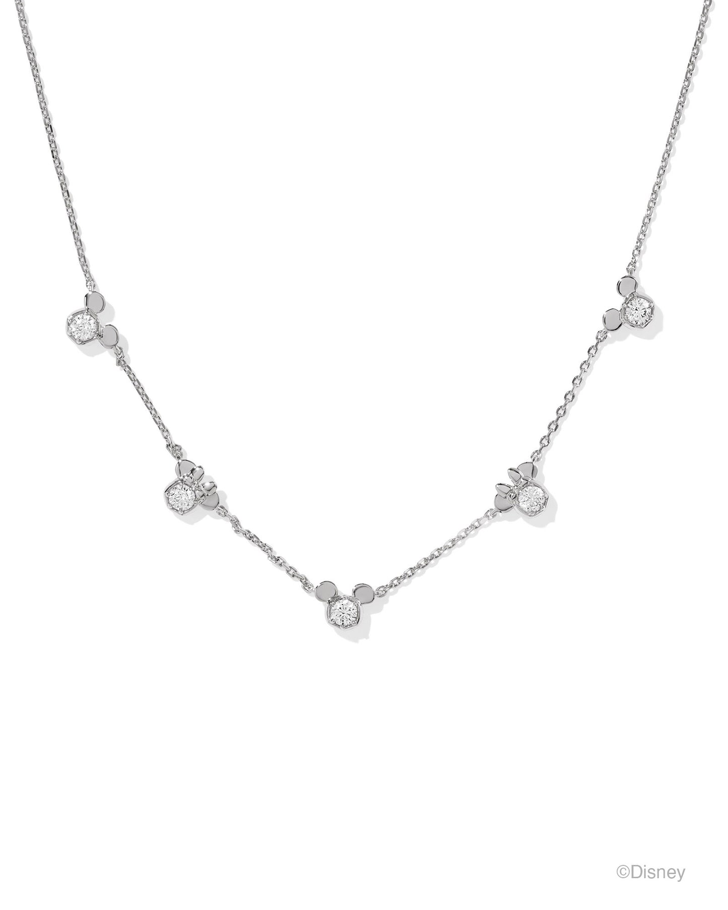 Crystal studded alternating "Mickey" and "Minnie" small head pendants. Silver necklace