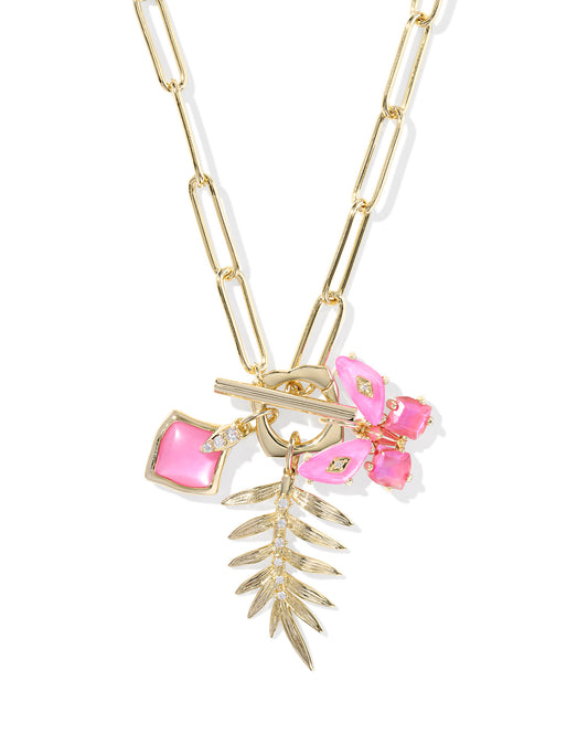 Gold charm like necklace with pink stone butterfly charm, gold palm tree leaf charm, diamond shaped charm with pink stone. Paper clip chain necklace.