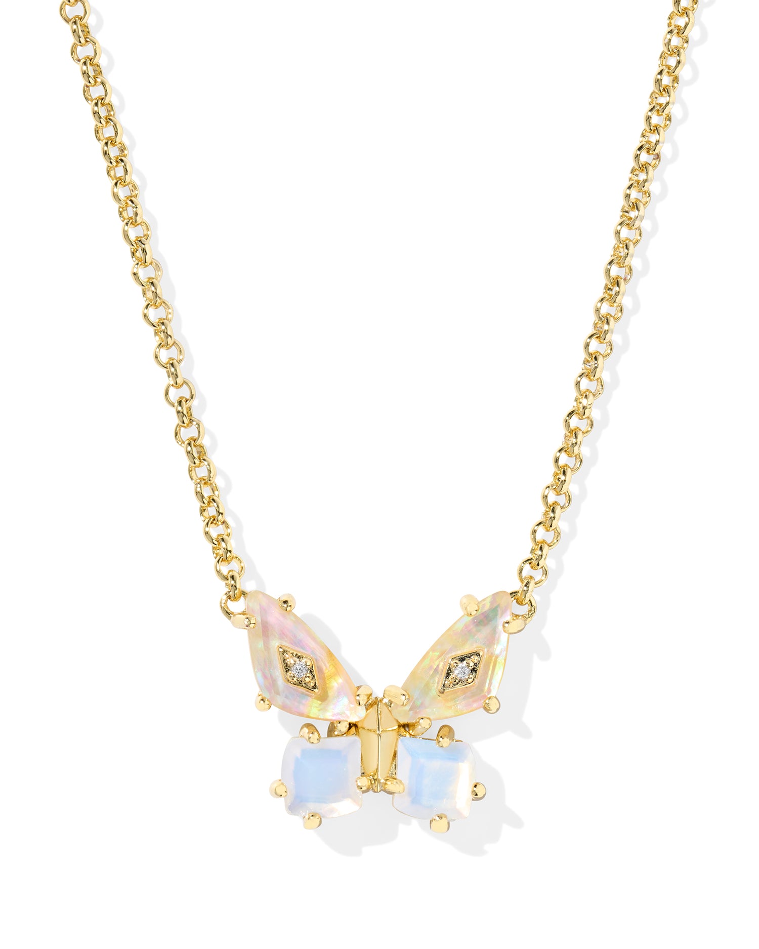 Butterfly pendant necklace. White mix of stones in the shape of a butterfly with gold accents. Gold chain with lobster clasp for closure and slider bead. 