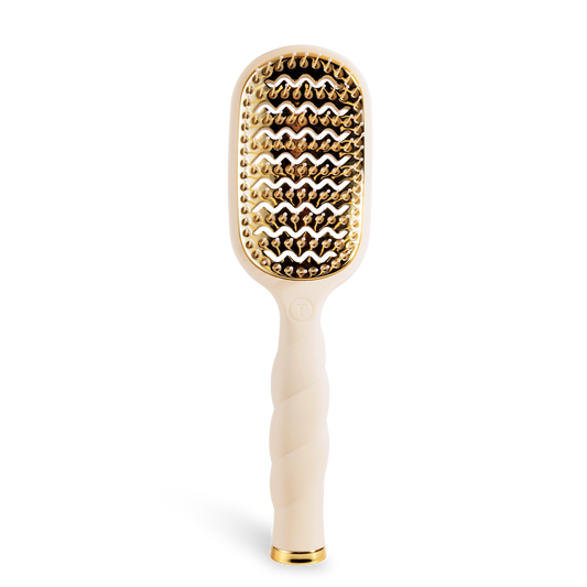 Oval hair brush, beige handle, gold  aluminum plate, gentle glide bristle, textured handle with gold trim, vented. 