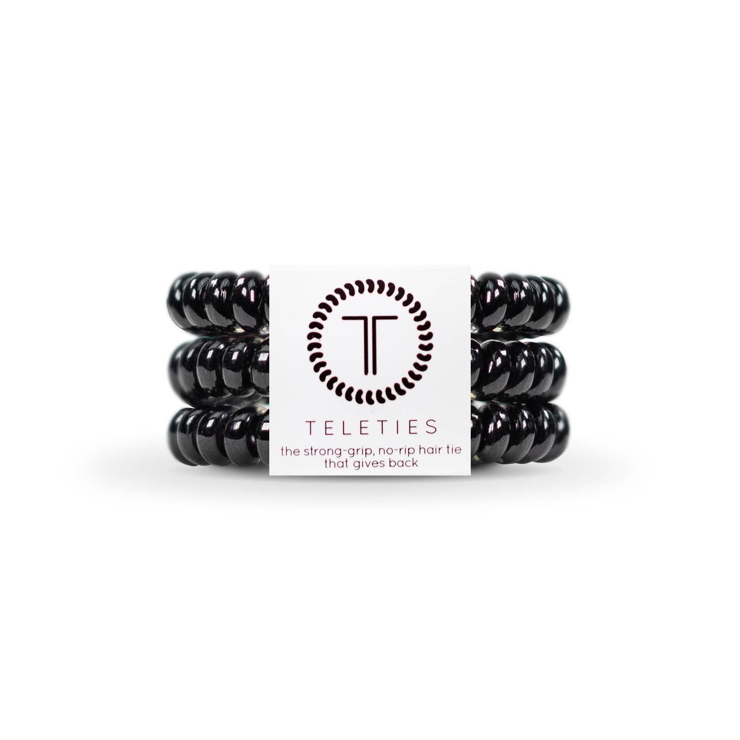 Hold your hair and enhance your style with TELETIES. The strong grip, no rip hair ties that double as a bracelet. Strong, pretty and stylish, TELETIES are designed to withstand everyday demands while taking your look to the next level. Sold in packs of three.  The small size is 4.5cm wide x 0.5cm thick jet black color
