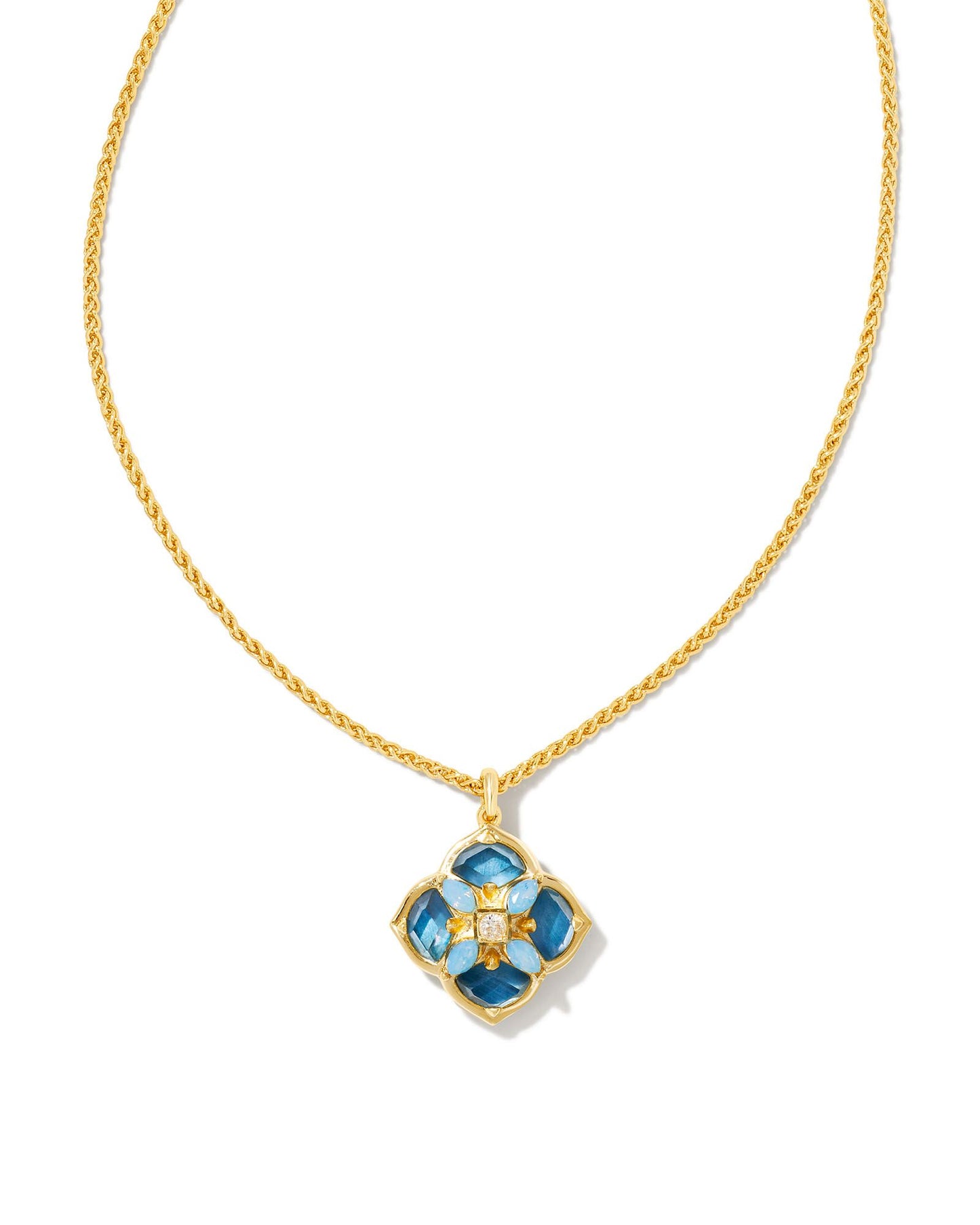 Our signature logo meets gorgeous stone detailing for the first time in the Dira Stone Gold Short Pendant Necklace. Featuring custom-cut stones and gems assembled into our logo shape, this pendant is bound to be a new favorite in your collection. The metal is 24k gold plated over brass with blue mix stones. 
