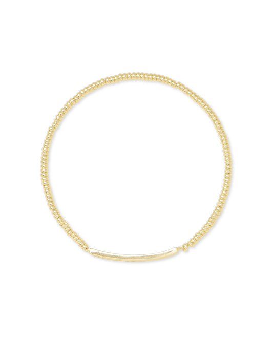 Gold beaded bracelet with crystal bar in the center of the bracelet