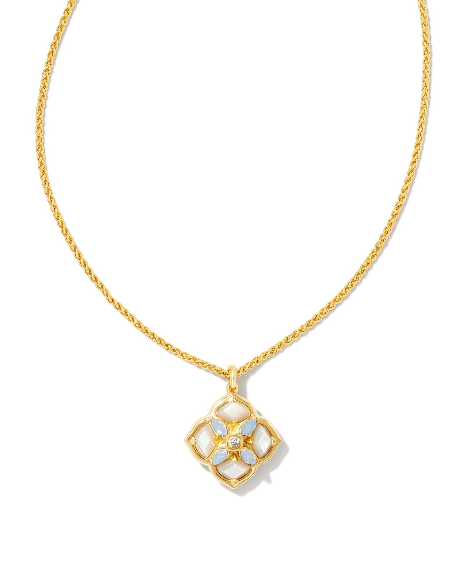 Our signature logo meets gorgeous stone detailing for the first time in the Dira Stone Gold Short Pendant Necklace. Featuring custom-cut stones and gems assembled into our logo shape, this pendant is bound to be a new favorite in your collection. The metal is 24k gold plated over brass with white stones. 