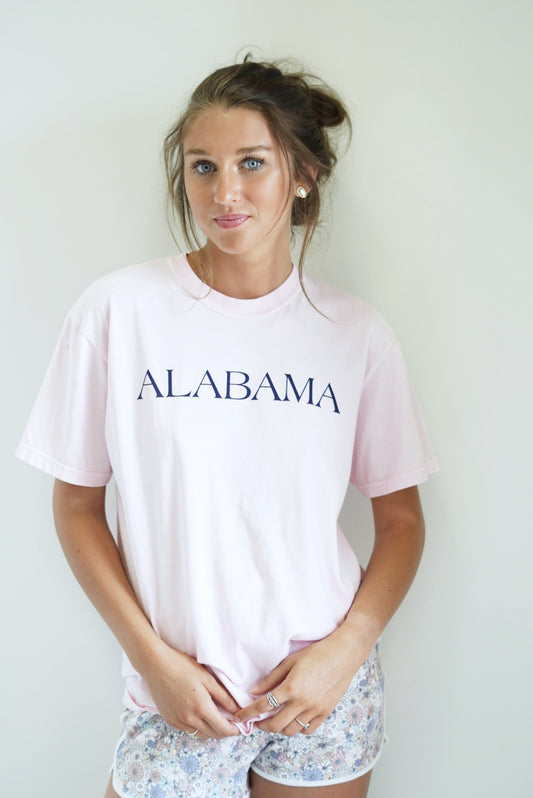 Paisley Pink Alabama T-Shirt  T-Shirt Crew Neckline Short Sleeve Alabama word detail Pink Shirt, Navy Blue writing True to size 100% Cotton Ring spun Model is wearing size: Small