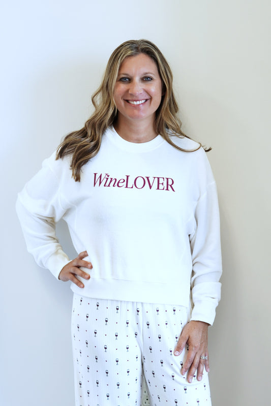 Wine Lover Long Sleeve Top Crew Neckline Long Cuffed Sleeves Cozy Material "Wine lover" written across the chest Full Length Relaxed Fit