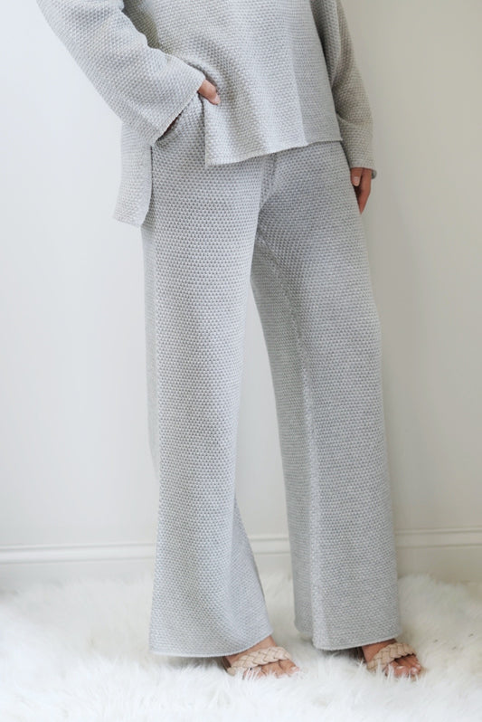 Honey Textured Wide Leg Sweater Pants Knit and Stretchy Waistband Wide Leg Pockets Heather Grey Color Ankle Length Relaxed Fit 55% Acrylic, 45% Cotton