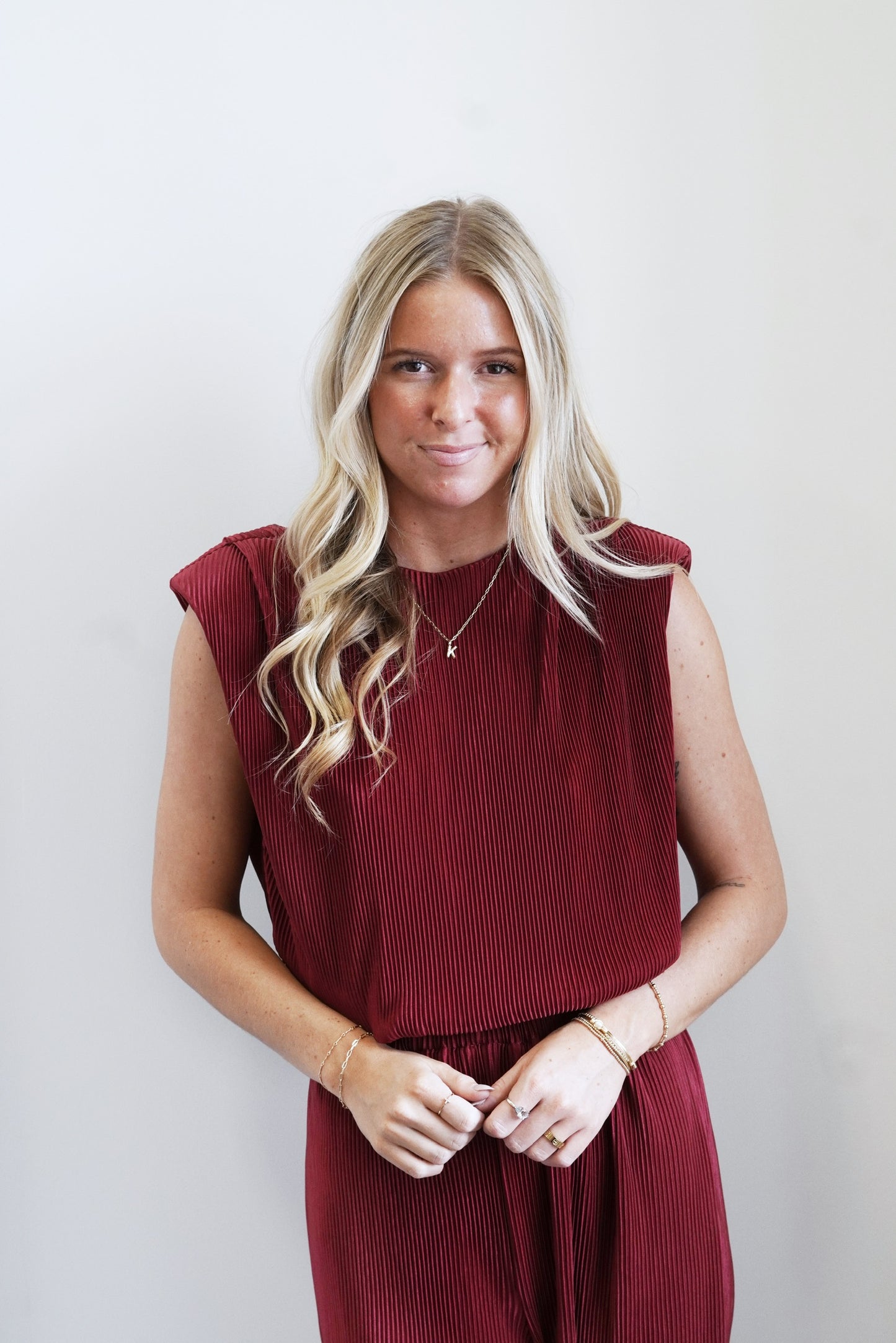 Bella Burgundy Formal Top Round Neckline, Back Button Closure Elastic Band On Bottom Of Top Sleeveless Shoulder Pads  Color/ Burgundy Loose Fitted 100% Polyester