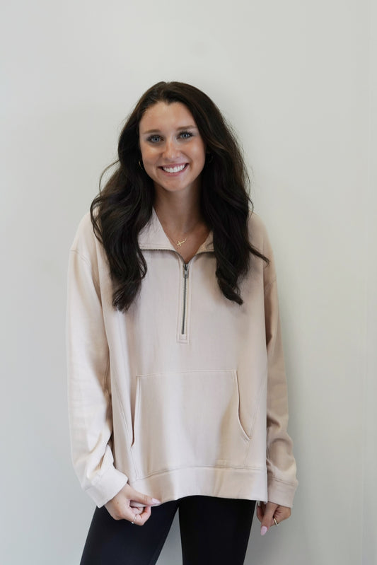 Hannah Half Zip Pullover Half Zip Up Collar NeckLine Long Sleeve Kangaroo Pocket Color: Taupe Full Length Relaxed Fit 63% Polyester, 33% Rayon, 4% Spandex