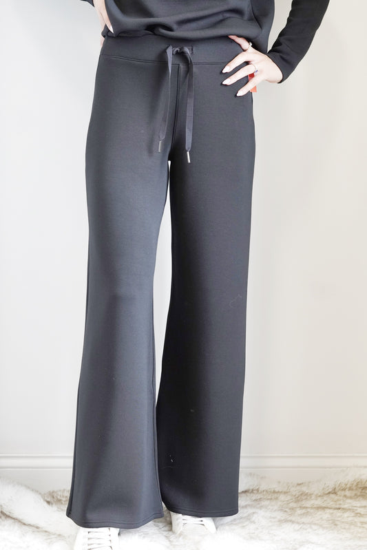 Spanx AirEssentials Wide Leg Sweatpants Drawstring Elastic Waistband Wide Legs Mid-Rise Full Length Relaxed fit with leg-lengthening wide leg Colors:  Black,  47% Modal, 46% Polyester, 7% Elastane