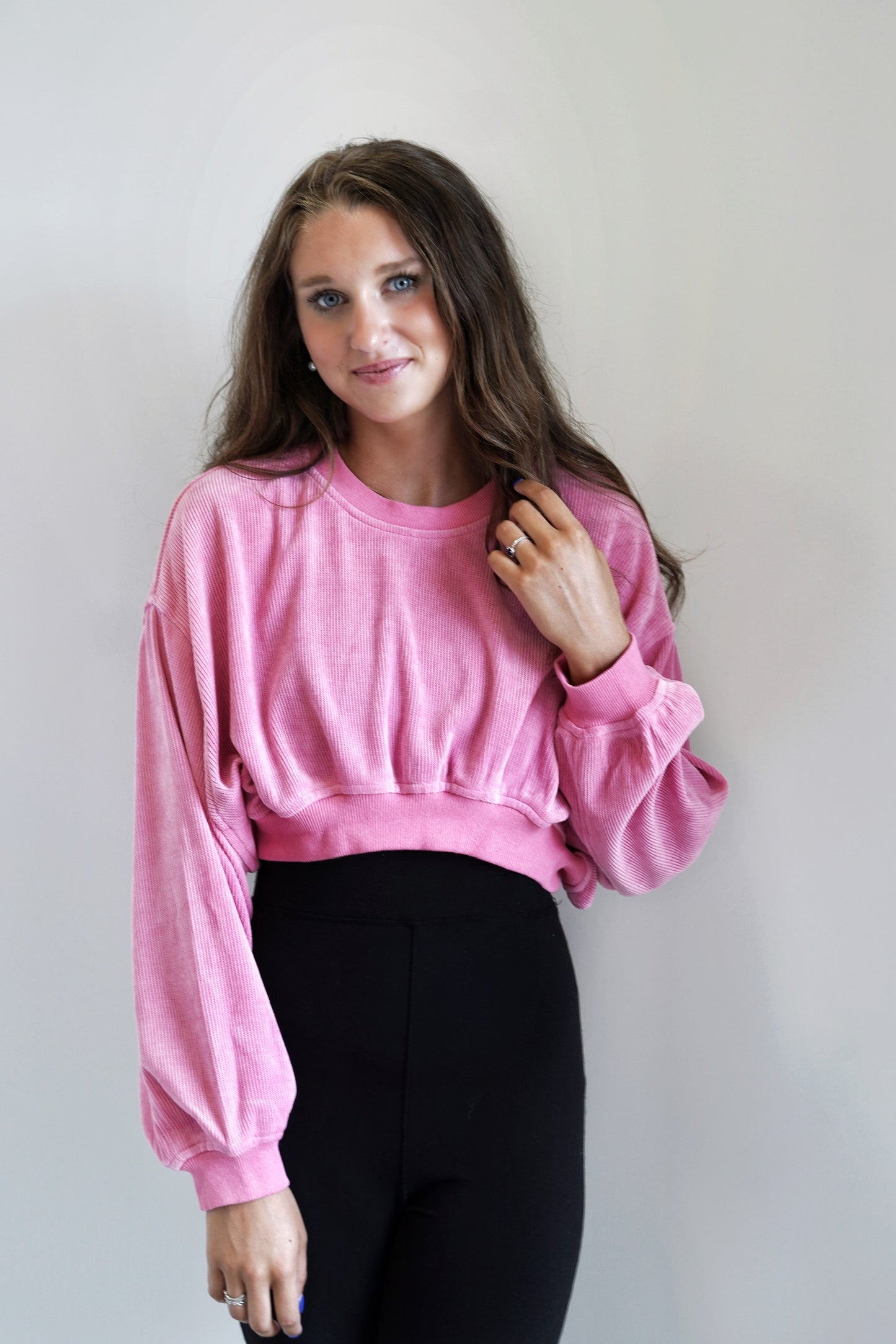 Wynter Waffle Knit Cropped Sweatshirt Crew Neckline Long Cuffed Sleeves Cuffed Hem Waffle Knit Fabric Cropped Length Relaxed fit Pink 100% Polyester