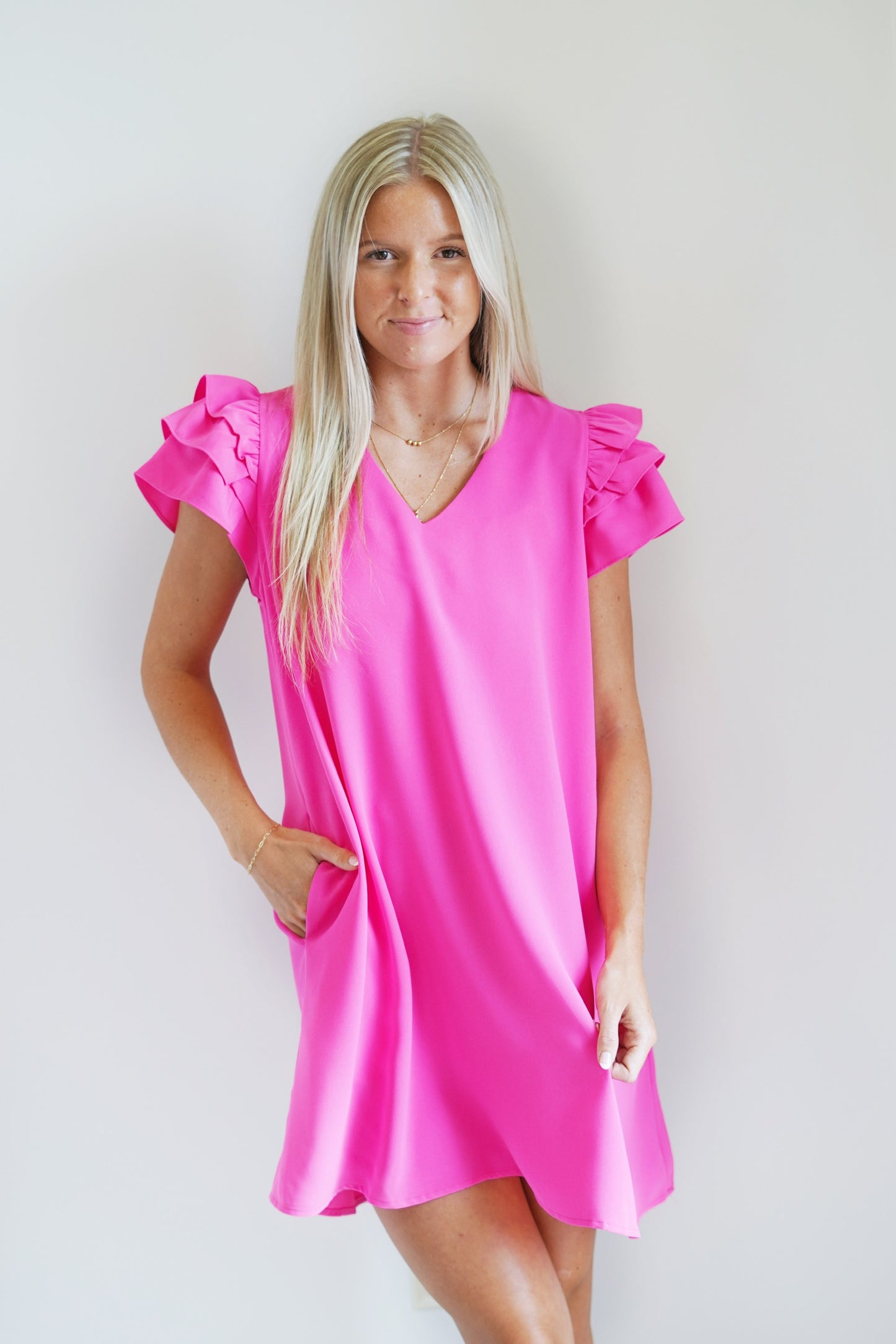 Hannah Hot Pink V-Neck Dress V-Neckline Ruffle Short Sleeve Hot Pink Vibrant Color Knee Length 100% Polyester Hand Wash Cold, Line Dry Model is wearing size:Small