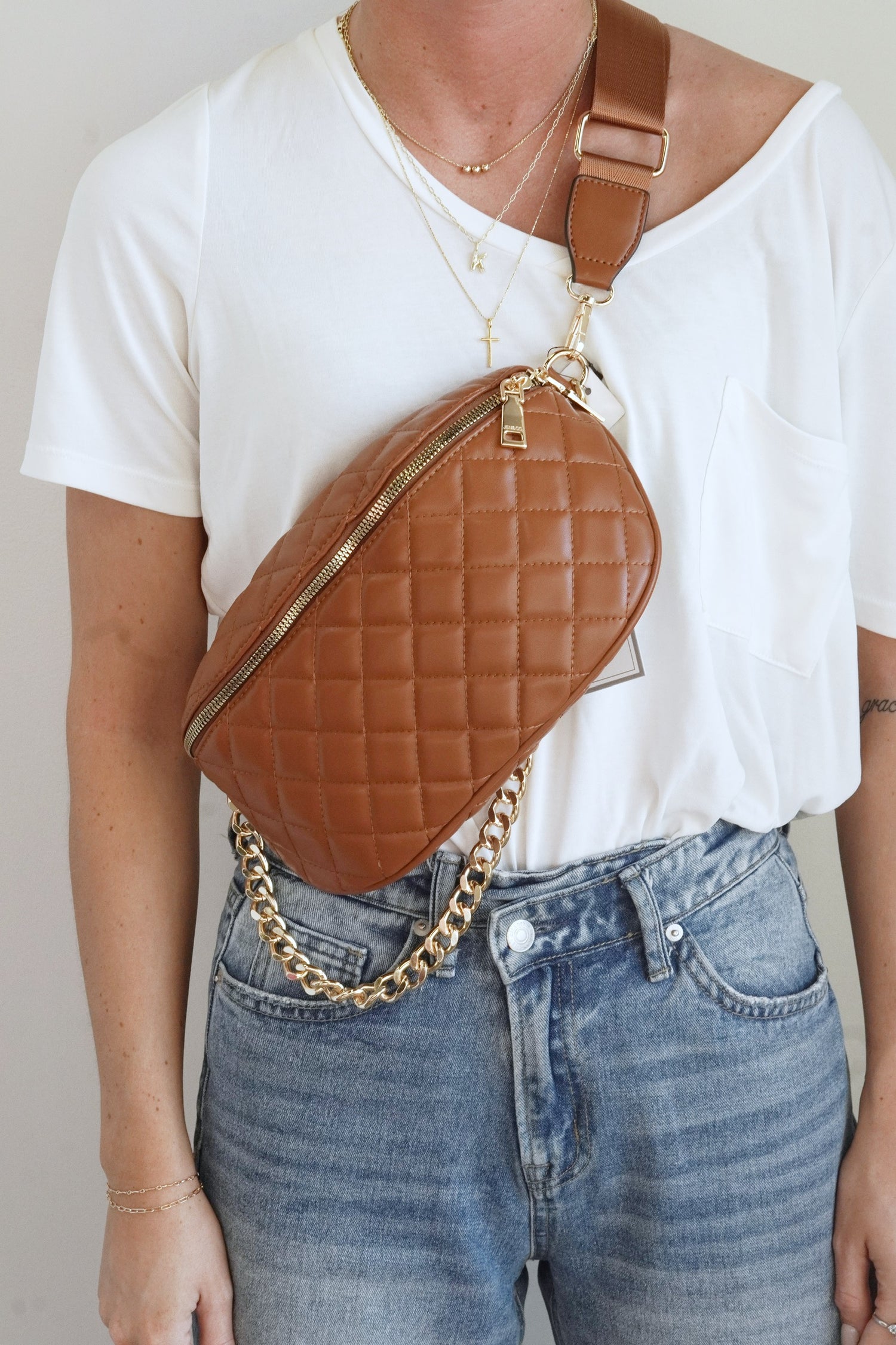 Sylvie Quilted Vegan Leather Bum Bag Removable Crossbody or Belt Strap Back Zipper Pocket Small Inner Zipper Pocket Ten Card Slots Gold Chain Detail Approx 10 1/2 in x 6 1/2 in x 4 in. brown color