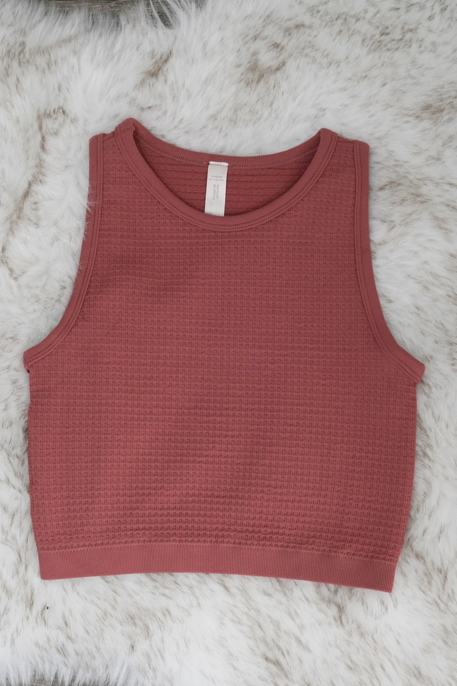 Tulla Textured Tank Top Round Neckline Sleeveless Textured Material Colors: Grapefruit Fitted Cropped 92% Nylon, 8% Spandex
