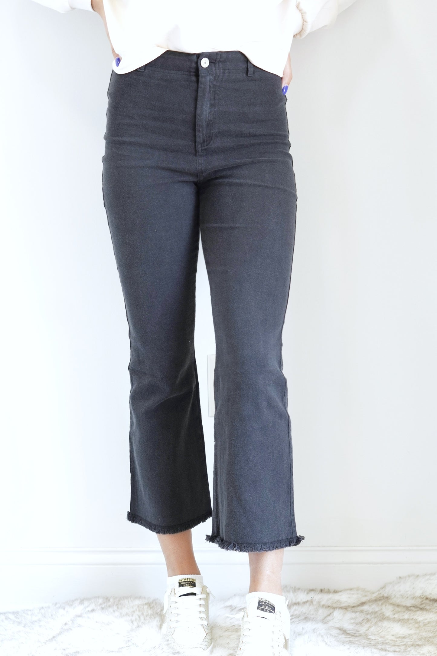 Judy Raw Hem High Waisted Pants Button Closure Wide Leg that hits above the ankle High Rise Black Color Cute edge detail Comfortable, stretchy fit 97% Cotton,3%Spandex Dry Clean Only
