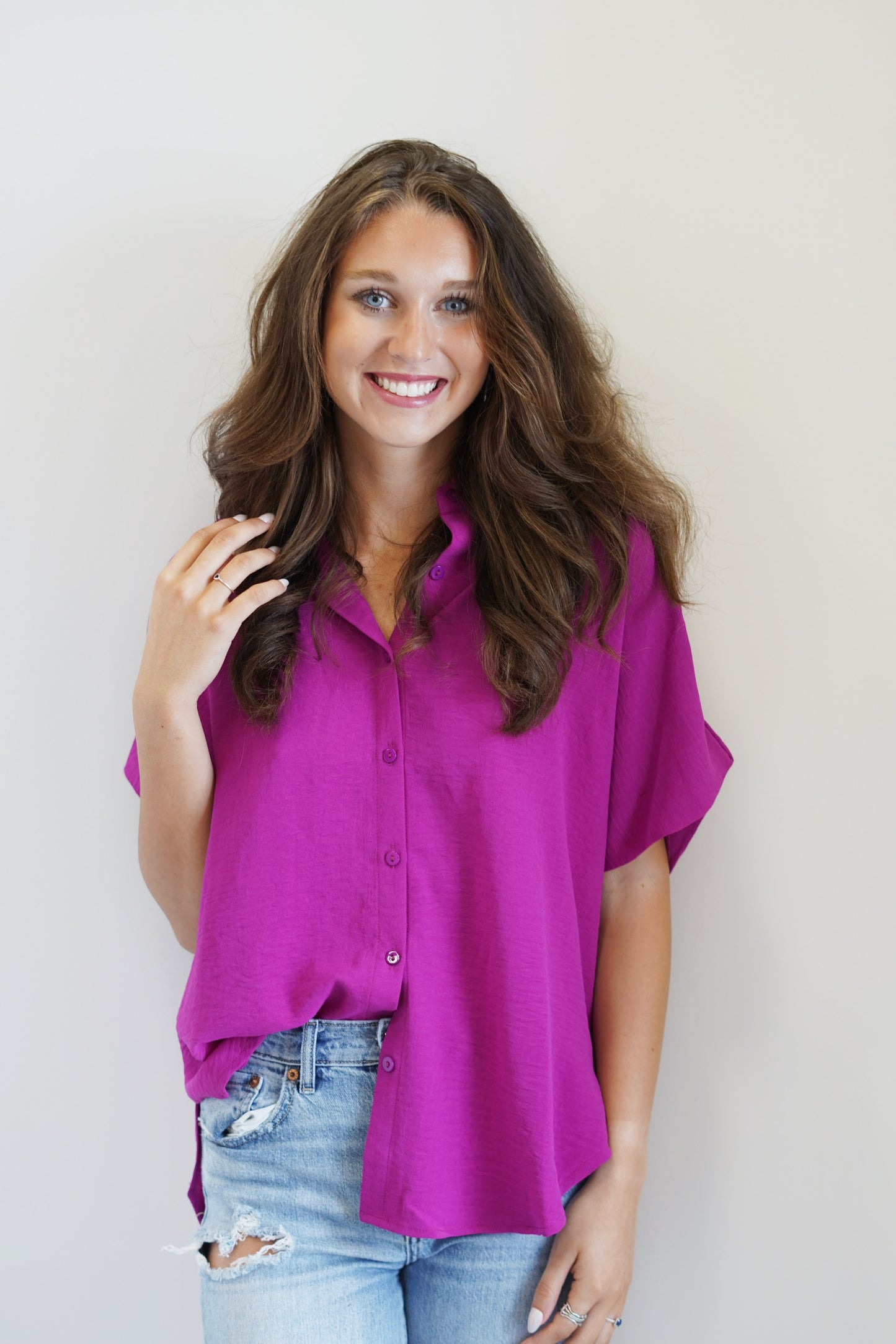 Olivia Button Up Blouse Collared  Button Up Blouse Short Sleeved Color: Magenta  95% Polyester  5% Spandex Hand Wash Cold, Do Not Wring Or Twist, Use Only None Chlorine Bleach, Line Dry, Low Iron If Needed Model is wearing size: Small