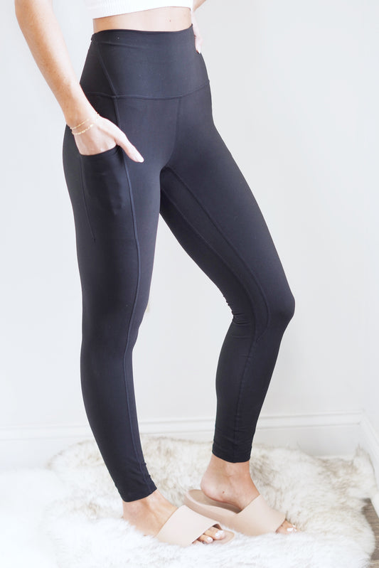 Brooklyn Butter Soft Full Length Leggings High Waisted Pocked on sides Pocket on inside of waistline on backside Color/Black Full Length Leggings Butter Soft Material 84% Poly Microfiber, 16% Spandex Wash with like colors Model is wearing a size small