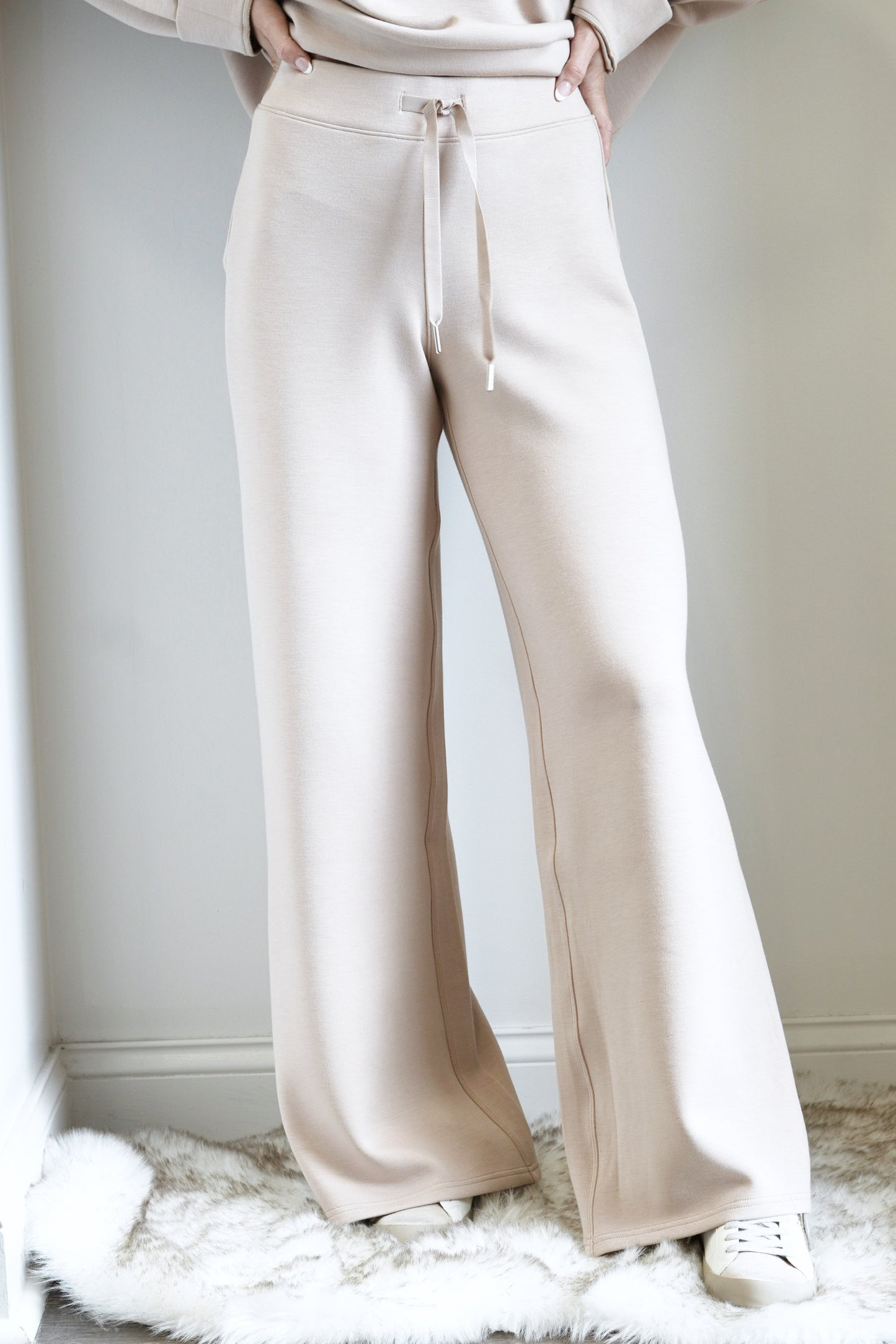 Spanx AirEssentials Wide Leg Sweatpants Drawstring Elastic Waistband Wide Legs Mid-Rise Full Length Relaxed fit with leg-lengthening wide leg Colors: Taupe 47% Modal, 46% Polyester, 7% Elastane