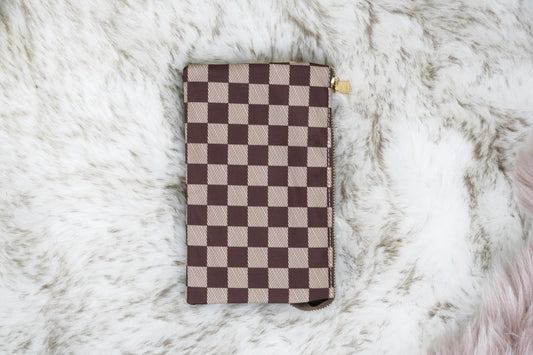 Riley Patterned Crossbody Wallet 5 Compartments 6 Card Slots  1 Interior Zipper  Zipper Closer  Colors: Brown/Tan Checkered One Crossbody Strap, One Wristlet Strap - Both Removable 8.5 x 5.5in