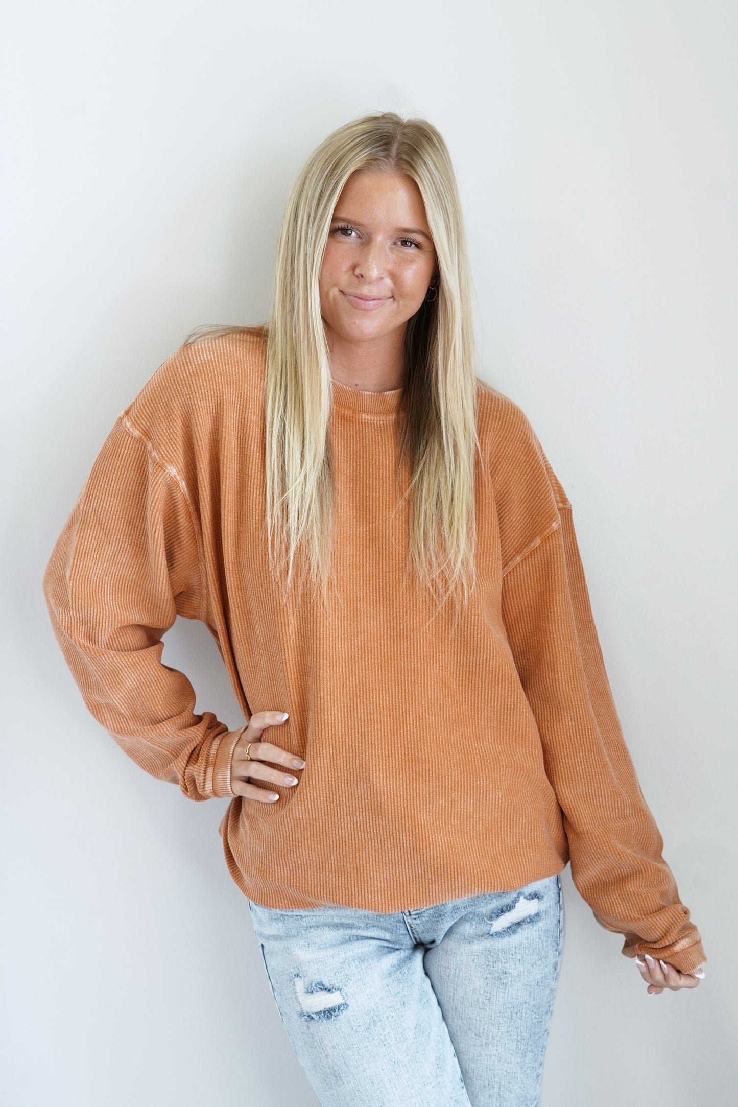 Calla Corded Crew Everyday Sweatshirt Crew Neckline Long Sleeve Corded Material Colors: Orange Full Length Relaxed Fit 100% Cotton