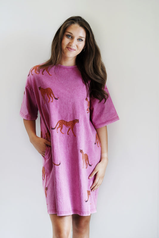 Cameron Short Sleeve Cheetah Print Dress Crewneck  Short Sleeve Cheetah Print  Magenta T-Shirt Dress, longer fit 2 side pockets 100% Cotton Hand Wash Cold Water Separately Hang Dry Model is wearing size: Small