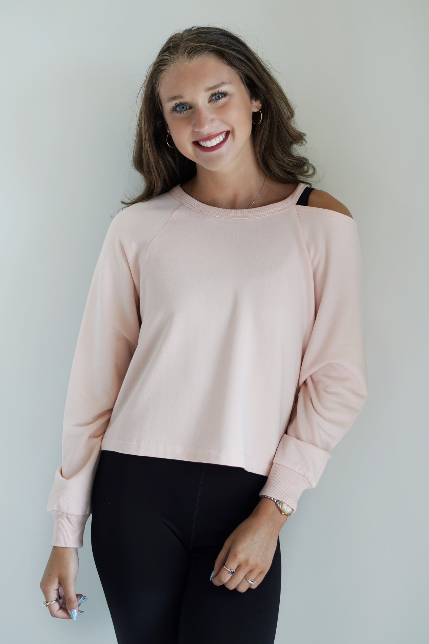 Savy Studio Modal Sweatshirt Crew Neckline Long Cuffed Sleeves Open Cold Shoulder Between the Crew Neckline and the Start of the Sleeve Rose Quartz Color Relaxed Fit Skimmer Length 97% Modal 3% Spandex