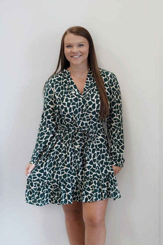 Jemma Geometric Print Waist Belted Dress Deep V-Neckline Above the Knee Length Tiered Ruffle Hem  Long sleeves Off white base w/ green print Loose Fit Waist Belt 100% Rayon